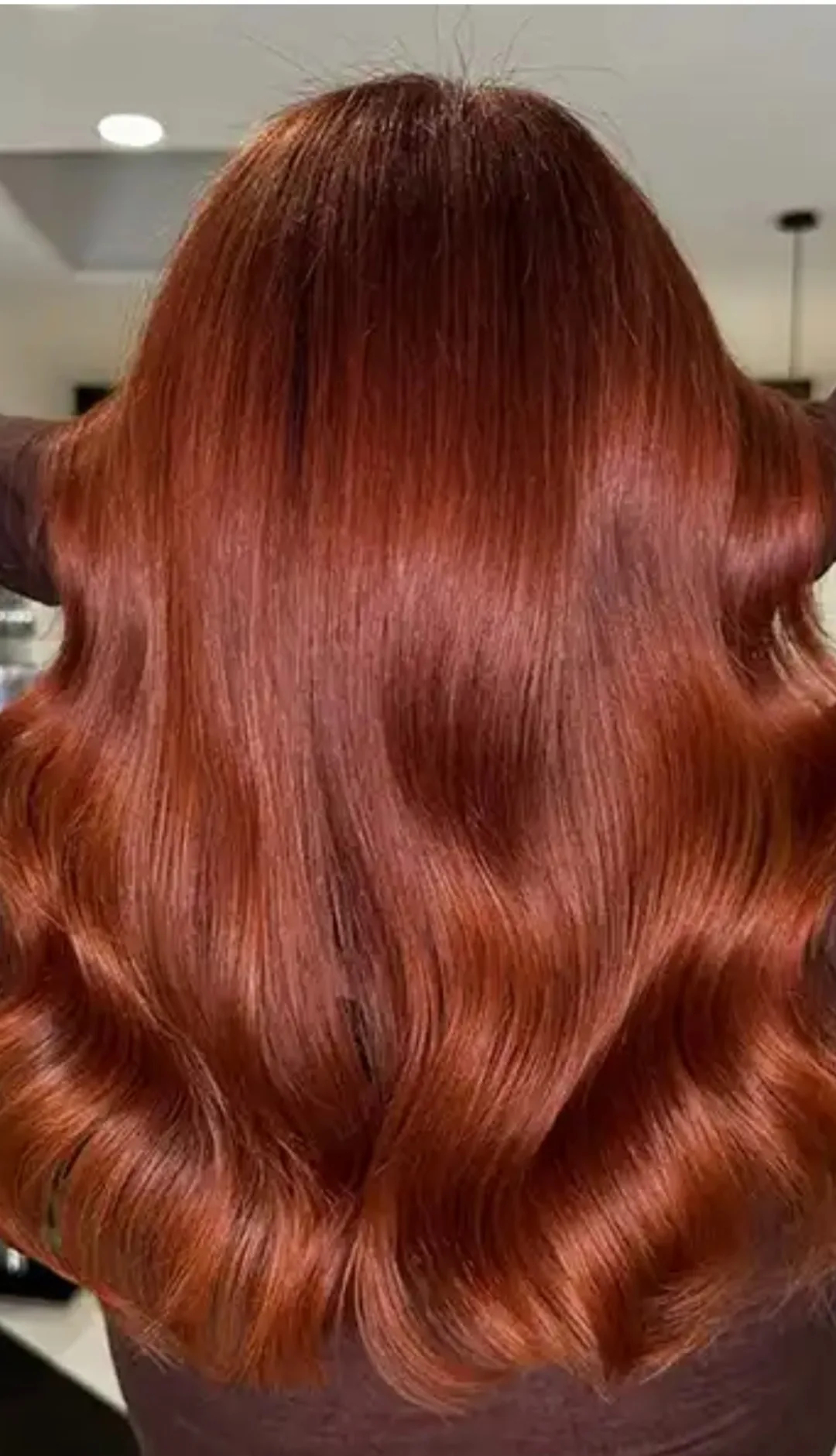 Glossy copper waves styled by Salon Jeffrey