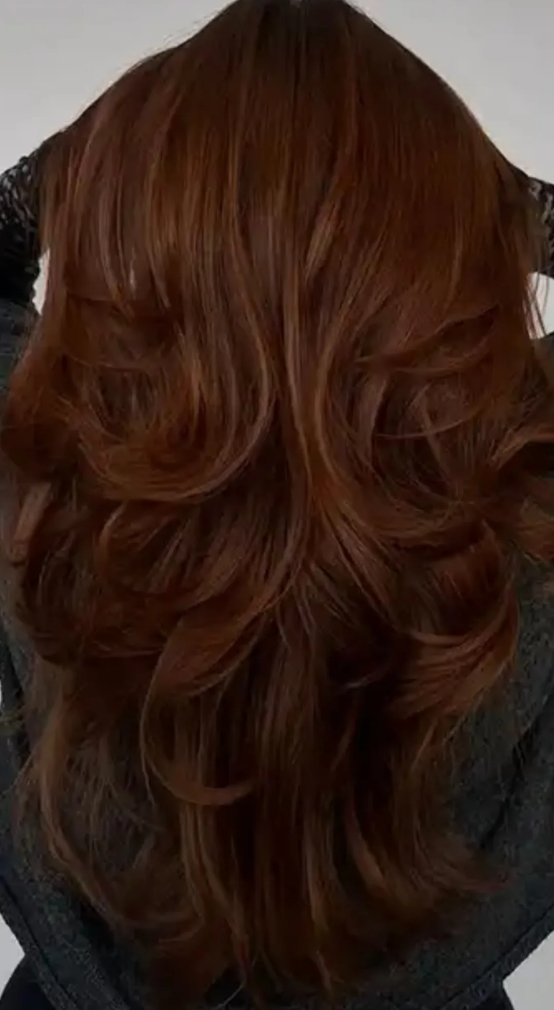 Layered brunette hair with soft movement